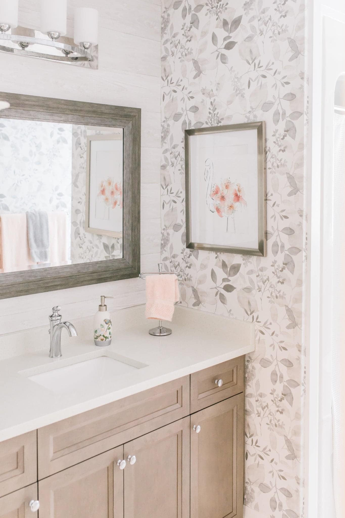 inspirational bathroom renovation using floral wallpaper in beautiful blushes and gray tones