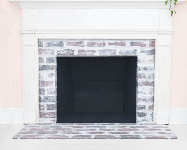 black paint inside of a fireplace
